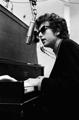 Bob Dylan at the piano, black and white photo