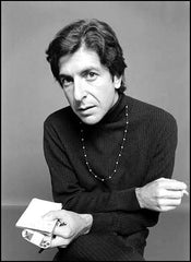 Leonard Cohen wears a bead necklace